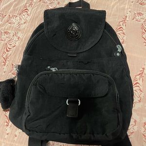 Kipling medium backpack and small crossbody bag